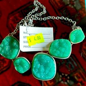 Druzy necklace silver tone clasp five stones of various size. Teal colored stone